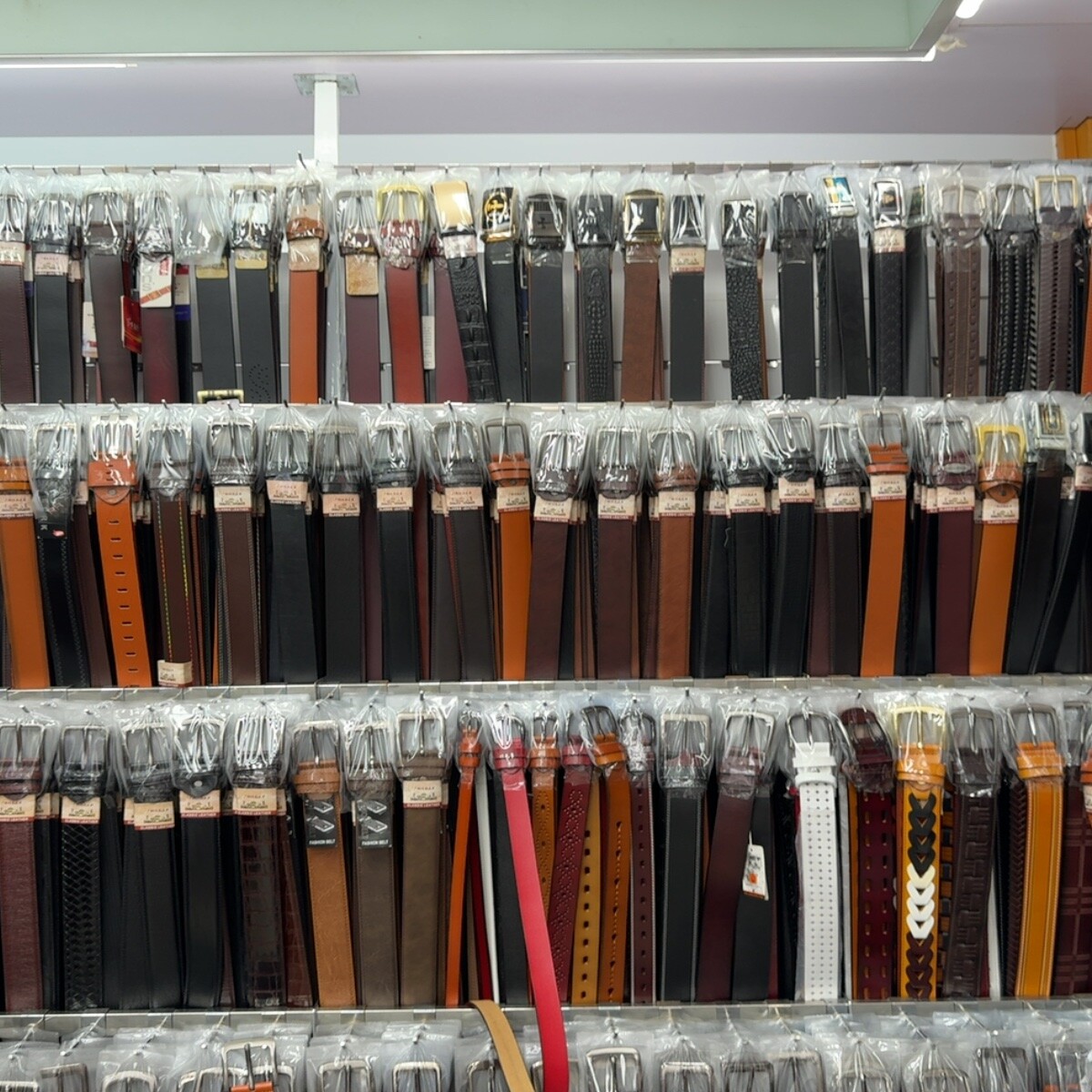 Чоловічі ремені оптом з Китаю в Україну
